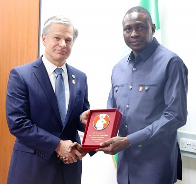 L-R: Federal Bureau of Investigation (FBI)’s Director, Christopher Wray and Economic and Financial Crimes Commission (EFCC) Executive Chairman, Mr. Ola Olukoyede